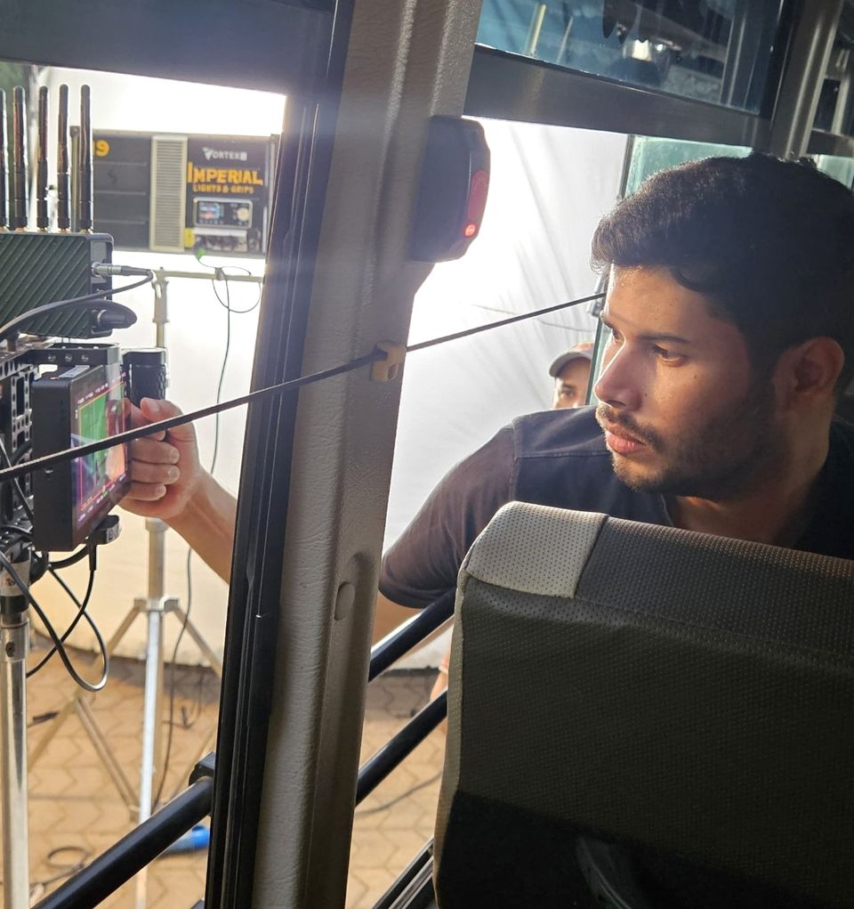 Rahul Mishra at the monitor on a film set
